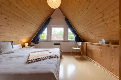 Ein Bett oder Betten in einem Zimmer der Unterkunft Ferienhaus 