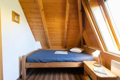 Ein Bett oder Betten in einem Zimmer der Unterkunft Ferienhaus 