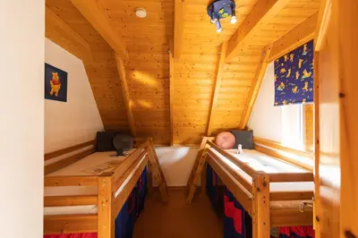 Ein Bett oder Betten in einem Zimmer der Unterkunft Ferienhaus 