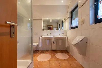 Ein Badezimmer in der Unterkunft Ferienhaus Opi Huck Stroot 19