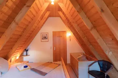 Ein Bett oder Betten in einem Zimmer der Unterkunft Ferienhaus Medemsand 01