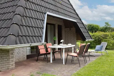 Ein Garten an der Unterkunft Ferienhaus Eversand 03