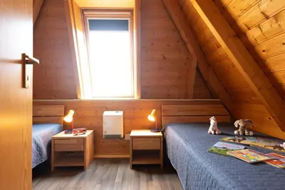 Ein Bett oder Betten in einem Zimmer der Unterkunft Ferienhaus 