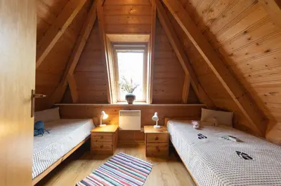 Ein Bett oder Betten in einem Zimmer der Unterkunft Ferienhaus Westertill 15