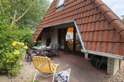 Ein Garten an der Unterkunft Ferienhaus Knechtsand 15