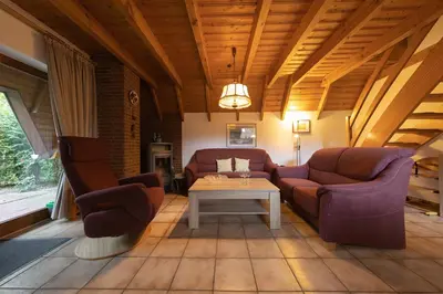 Ein Sitzbereich in der Unterkunft Ferienhaus Knechtsand 15