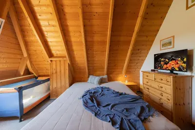 Ein Bett oder Betten in einem Zimmer der Unterkunft Ferienhaus 