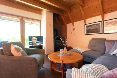 Ein Sitzbereich in der Unterkunft Ferienhaus 