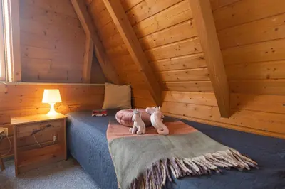 Ein Bett oder Betten in einem Zimmer der Unterkunft Ferienhaus Tegeler Plate 02