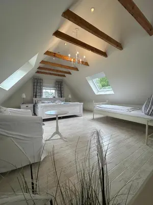 Ein Bett oder Betten in einem Zimmer der Unterkunft Ferienwohnung am Wernerwald