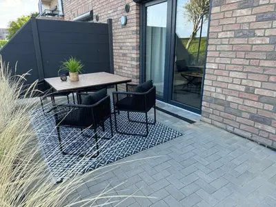 Ein Balkon oder eine Terrasse in der Unterkunft Hafenglück Friedrichskoog