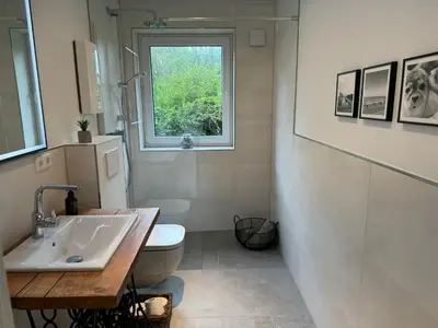 Ein Badezimmer in der Unterkunft Hafenglück Friedrichskoog