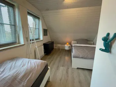 Ein Bett oder Betten in einem Zimmer der Unterkunft Ferienhaus Seeperle