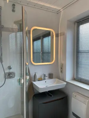 Ein Badezimmer in der Unterkunft Ferienhaus Seeperle