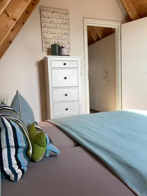 Ein Bett oder Betten in einem Zimmer der Unterkunft Ferienhaus Zimmers-Nordseehaus
