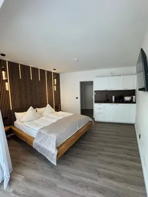 Ein Bett oder Betten in einem Zimmer der Unterkunft Strandjuwel in der Seehütte Cuxhaven Duhnen- Exclusive Ferienwohnung am Strand mit Meerblick