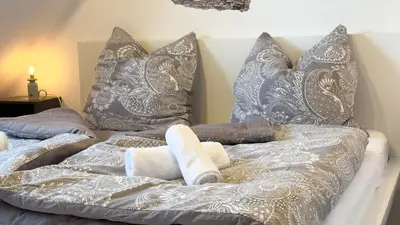 Ein Bett oder Betten in einem Zimmer der Unterkunft Meerblick Apartment Nordseeperle 11