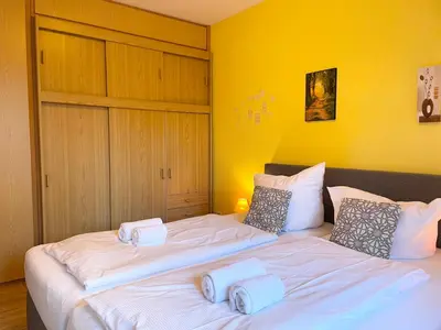 Ein Bett oder Betten in einem Zimmer der Unterkunft Nige Ooge FeWo 10