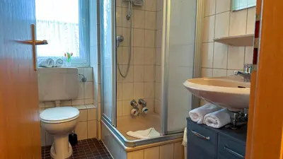 Ein Badezimmer in der Unterkunft Nige Ooge FeWo 10