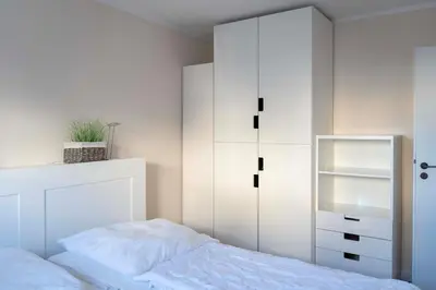 Ein Bett oder Betten in einem Zimmer der Unterkunft Haus Seemöwe, Whg 1