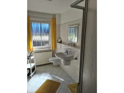 Ein Badezimmer in der Unterkunft Haus Nordseewind XL - Apartment 1