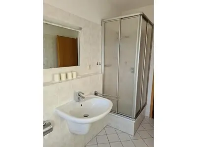 Ein Badezimmer in der Unterkunft Haus Nordseewind XL - Apartment 1
