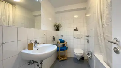 Ein Badezimmer in der Unterkunft Haus Nordseebrandung FeWo A1 2