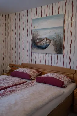 Ein Bett oder Betten in einem Zimmer der Unterkunft Schloß Am Meer - Wohnung 26