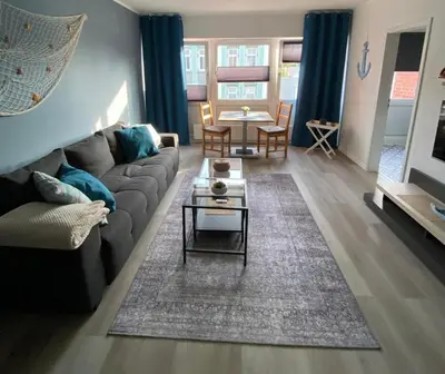 Ein Sitzbereich in der Unterkunft Gemütliche Ferienwohnung im Lotsenviertel