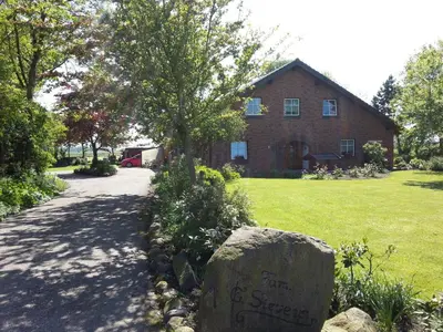 Ein Garten an der Unterkunft Ferienwohnung Sievers