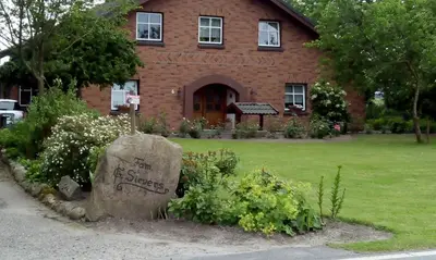 Ein Garten an der Unterkunft Ferienwohnung Sievers