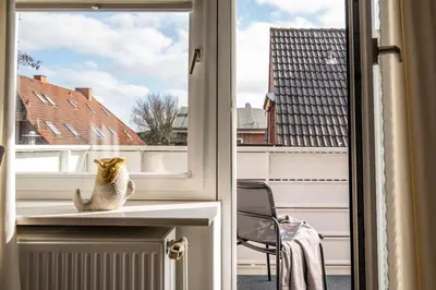 Ein Balkon oder eine Terrasse in der Unterkunft Op de Westerwarft Wohnung 4