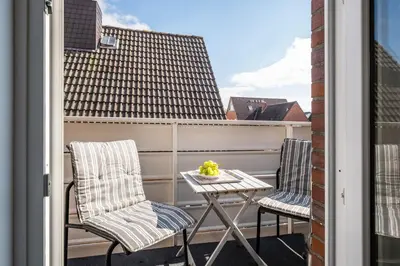 Ein Balkon oder eine Terrasse in der Unterkunft Op de Westerwarft Wohnung 3