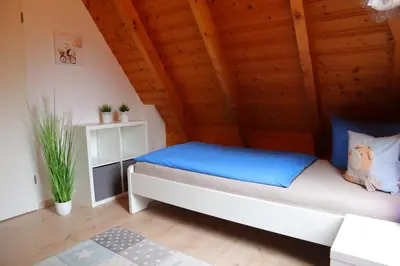 Ein Bett oder Betten in einem Zimmer der Unterkunft Ferienhaus Mika