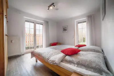 Ein Bett oder Betten in einem Zimmer der Unterkunft Elbstrom, Ferienwohnung 1