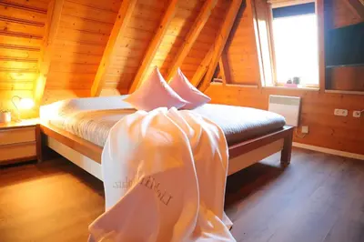 Ein Bett oder Betten in einem Zimmer der Unterkunft Ferienhaus Haase