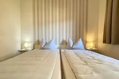 Ein Bett oder Betten in einem Zimmer der Unterkunft Ferienwohnungen Reimann Wohnung 4