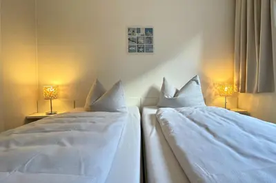 Ein Bett oder Betten in einem Zimmer der Unterkunft Ferienwohnungen Reimann Wohnung 1