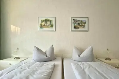 Ein Bett oder Betten in einem Zimmer der Unterkunft Ferienwohnungen Reimann Wohnung 3