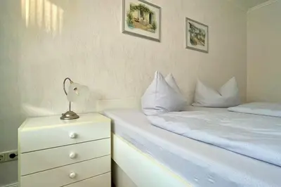 Ein Bett oder Betten in einem Zimmer der Unterkunft Ferienwohnungen Reimann Wohnung 3