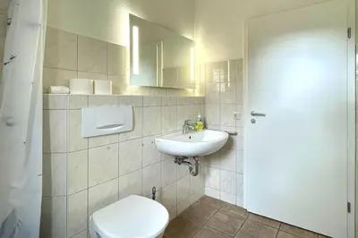 Ein Badezimmer in der Unterkunft Ferienwohnungen Reimann Wohnung 5