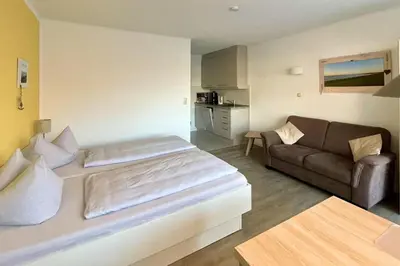 Ein Bett oder Betten in einem Zimmer der Unterkunft Ferienwohnungen Reimann Wohnung 07