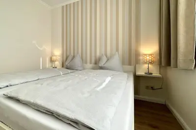 Ein Bett oder Betten in einem Zimmer der Unterkunft Ferienwohnungen Reimann Wohnung 9