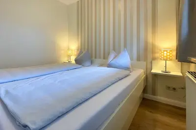 Ein Bett oder Betten in einem Zimmer der Unterkunft Ferienwohnungen Reimann Wohnung 6