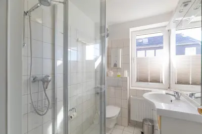 Ein Badezimmer in der Unterkunft Haus Nordseeperle Wohnung 6