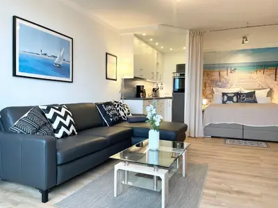 Ein Sitzbereich in der Unterkunft Strandhochhaus Sahlenburg FeWo H3