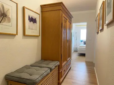 Ein Bett oder Betten in einem Zimmer der Unterkunft Strandhochhaus Sahlenburg FeWo H3