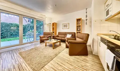 Ein Sitzbereich in der Unterkunft Anlage Am Wehrberg - Wohnung Eule