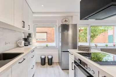 Küche/Küchenzeile in der Unterkunft Direkt an der Perlebucht - Wattn' Glück by Nordic Homes