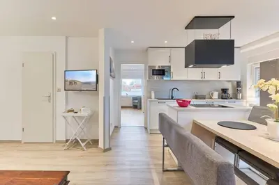 Küche/Küchenzeile in der Unterkunft Direkt an der Perlebucht - Wattn' Glück by Nordic Homes